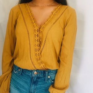 Yellow lace trim wrap blouse